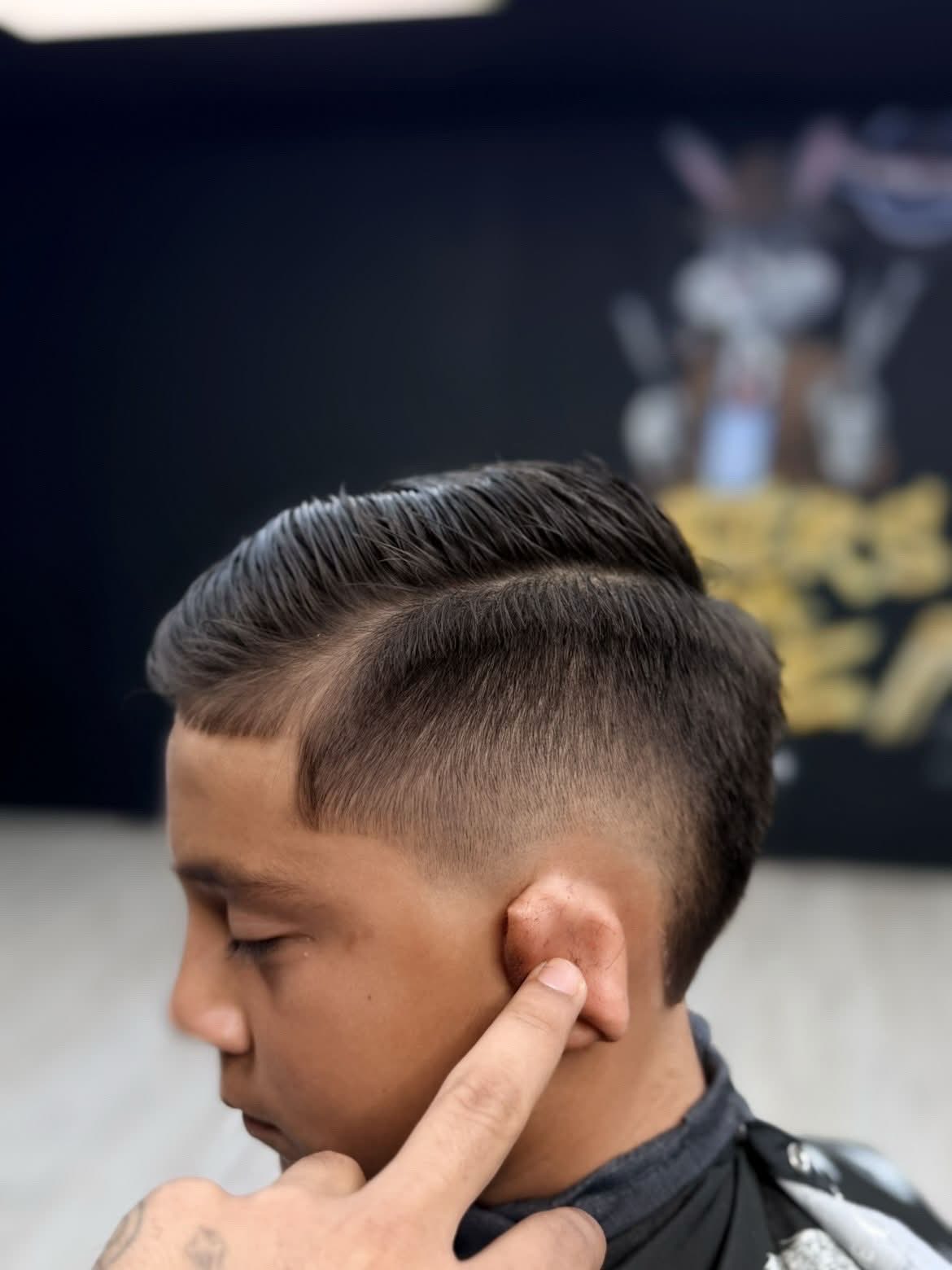 Side part fade at Masters of da Fade