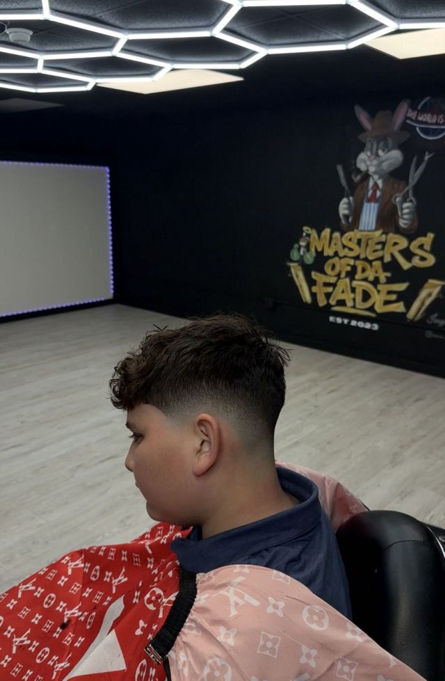 Curly fade finished at Masters of da Fade